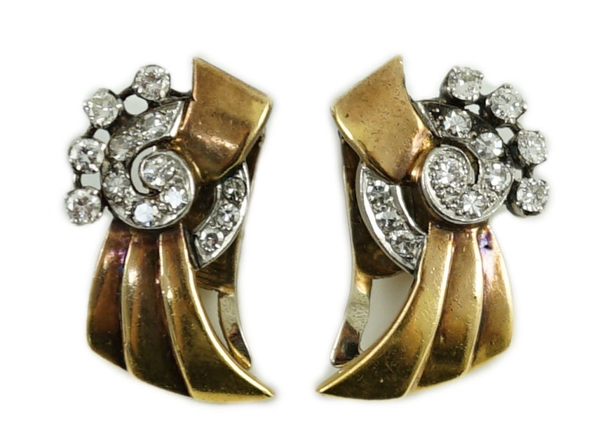 A pair of 1940's/1950's continental gold and diamond cluster set fan shaped ear clips